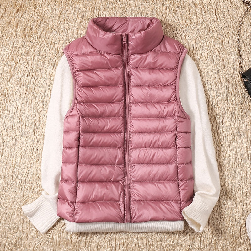 WMNS Sleeveless Extra Long Puffer Ves - Pink